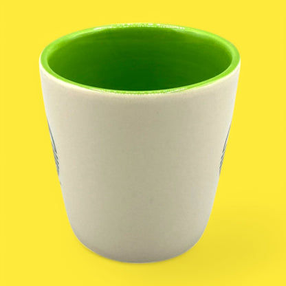 Starbucks Partner Exclusive Shot Glass - 2011 features the iconic siren logo in vibrant green and white design.