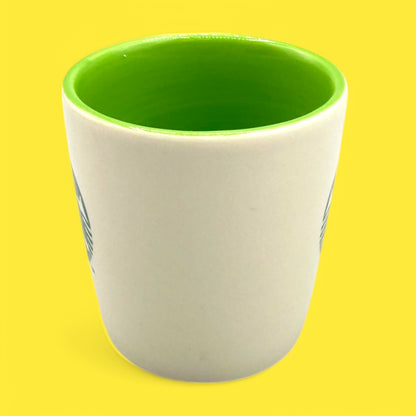 Starbucks Partner Exclusive Shot Glass - 2011 features a vibrant green interior and the iconic siren logo for collectors.