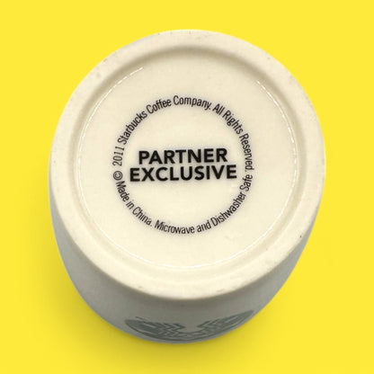 Starbucks Partner Exclusive Shot Glass - 2011 showcasing the iconic siren logo in vibrant green and white.