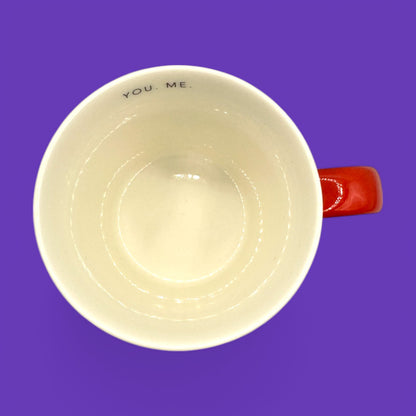 Starbucks You & Me mug showcases a sleek design with a red handle and "YOU. ME." lettering for a charming touch.