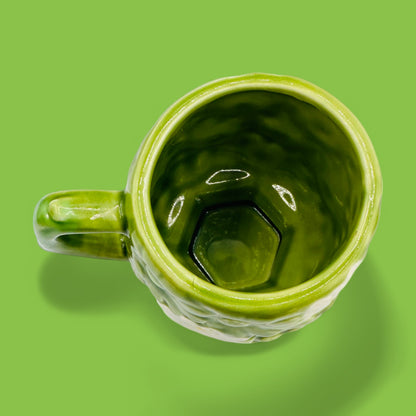 Vintage Fred Roberts Co. Green Daisy Earthenware Mug - Replacement Mug features a vibrant green glaze and unique design.