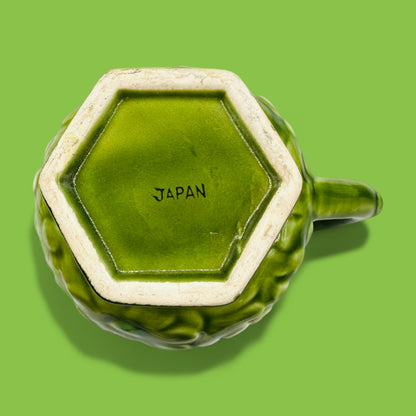Vintage Fred Roberts Co. Green Daisy Earthenware Mug - Replacement Mug with vibrant green glaze and raised white daisies.