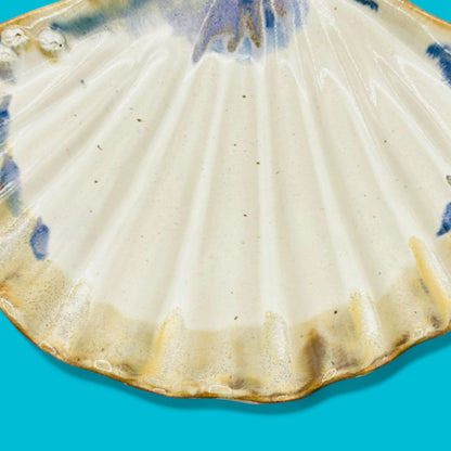 Large Ceramic Scallop Shell Dish - Coastal Decor - 11.4" features a creamy white finish with blue and brown accents.
