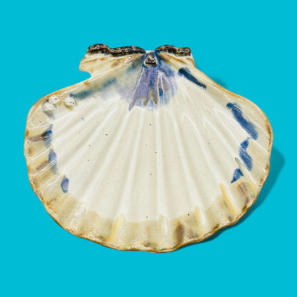 Large Ceramic Scallop Shell Dish - Coastal Decor - 11.4" features a creamy white interior with blue and brown accents.