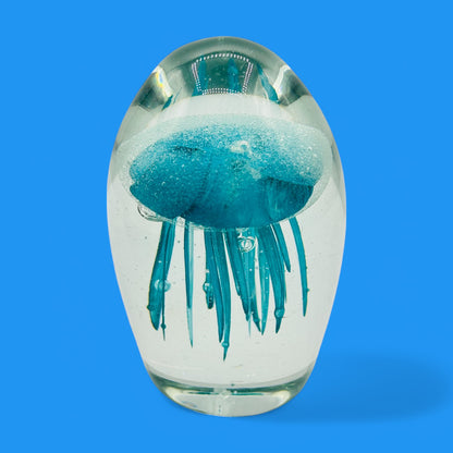 Teal Jellyfish Glass Paperweight - Vintage Charm - Glows in the Dark, showcasing a mesmerizing jellyfish in crystal-clear glass.