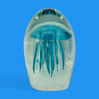 Teal Jellyfish Glass Paperweight - Vintage Charm - Glows in the Dark, showcasing a stunning jellyfish in crystal-clear glass.