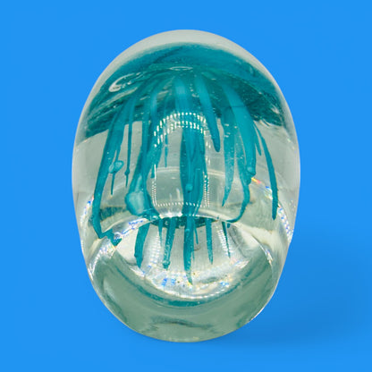 Teal Jellyfish Glass Paperweight - Vintage Charm - Glows in the Dark, showcasing mesmerizing underwater beauty.