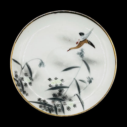 Vintage Japanese Crane Plate - Hand-Painted, Gold Rimmed, Signed, showcasing a graceful crane in flight against soft tones.
