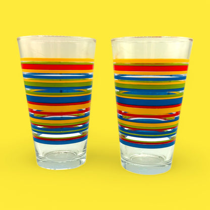 Bright and colorful Vintage Libbey Fiesta Mambo Striped Tumblers, MCM Rainbow Glass Set (2) for retro drinkware charm.