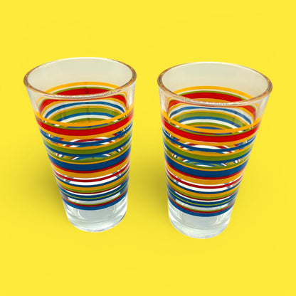 Vintage Libbey Fiesta Mambo Striped Tumblers, MCM Rainbow Glass Set (2) with colorful stripes for retro drinkware charm.