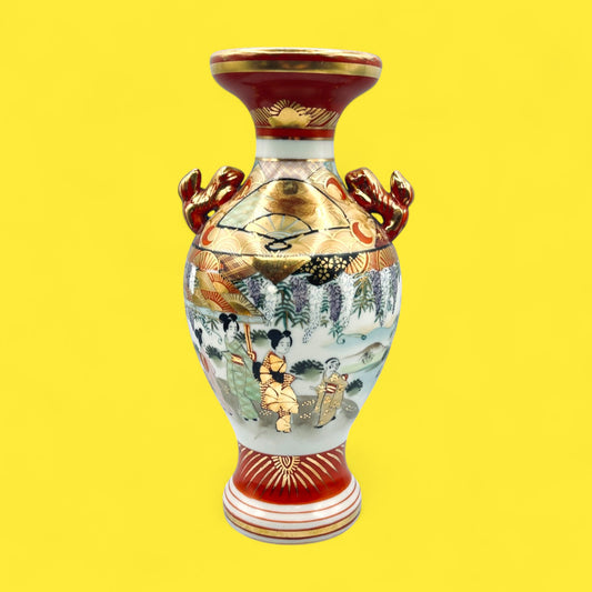 Meiji Period hand-painted Kutani vase with foo dog handles 25 cm tall