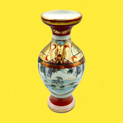 Meiji Period hand-painted Kutani vase with foo dog handles 25 cm tall