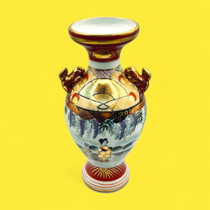Meiji Period hand-painted Kutani vase with foo dog handles 25 cm tall