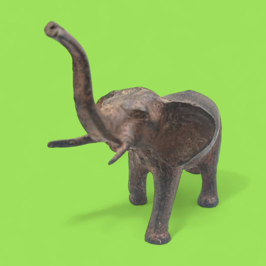 Vintage Cast Iron Elephant Statue with Raised Trunk