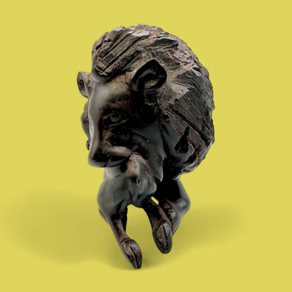 African Hand-Carved Ebony Lion with Prey Sculpture