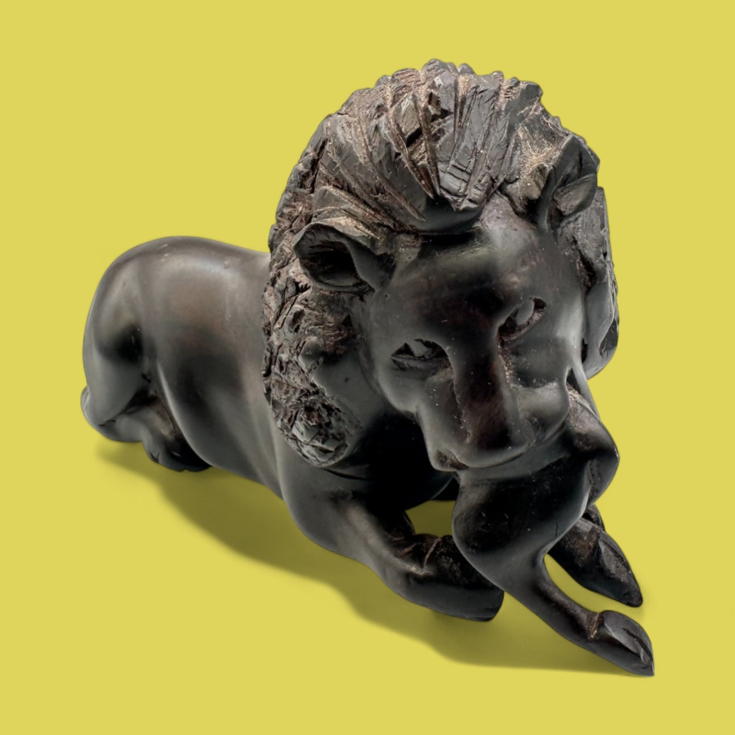 African Hand-Carved Ebony Lion with Prey Sculpture
