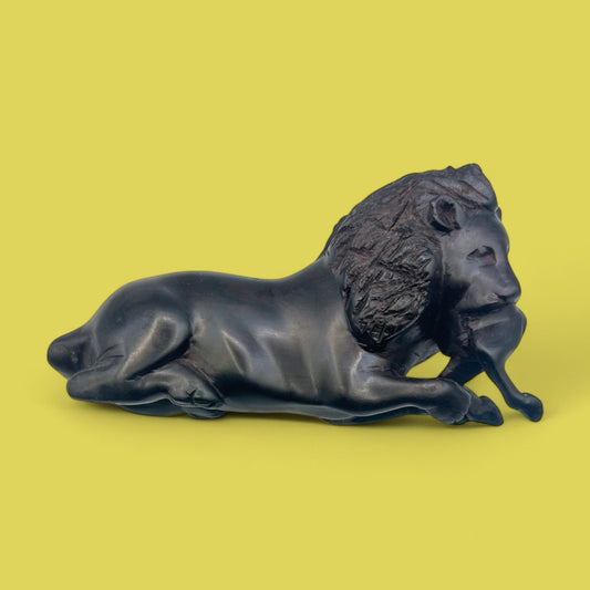 African Hand-Carved Ebony Lion with Prey Sculpture