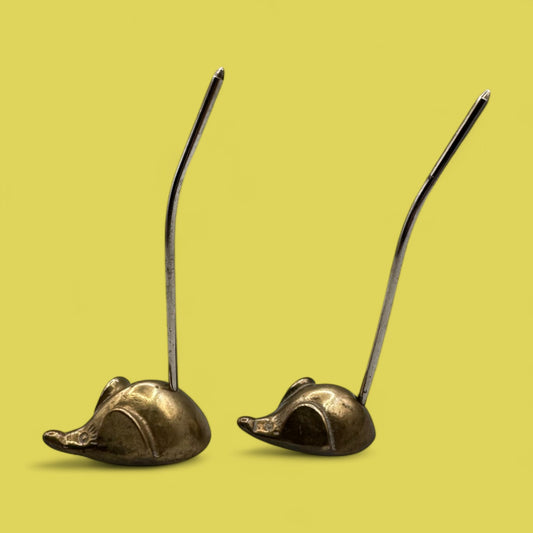 Pair of mid-century modern brass mice with curved tails