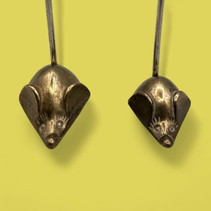 Pair of mid-century modern brass mice with curved tails