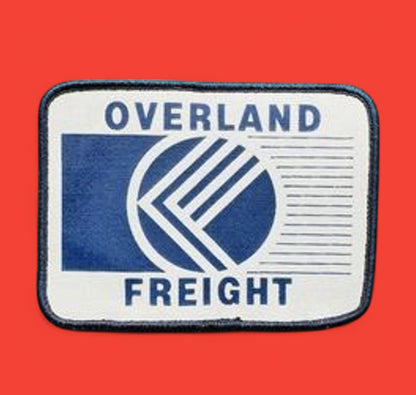 Overland freight embroidered patch, perfect for truckers hats, celebrating vintage trucking culture from the 1980s.